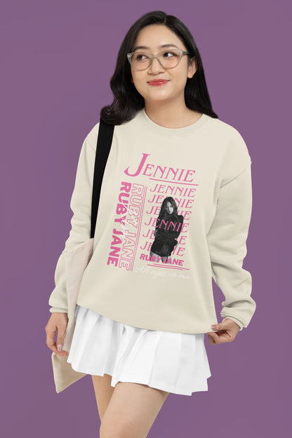 Fourth front view of female model wearing a cream sweatshirt featuring a stylish design inspired by Blackpink member Jennie. Ideal for fans of Jennie, Blackpink, and K-Pop music enthusiasts interested in idol fashion.