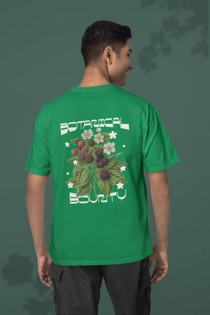 Back view of a male model model wearing a forest green with a design featuring berry bushes overflowing with fruit, symbolizing the abundance and beauty of nature.