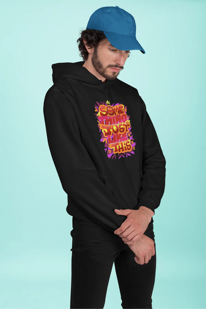 First front view of a male model wearing an black hoodie featuring the designs inspired from Coldplay's "Something Just Like This" music video.