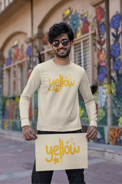 First front view of a male model wearing a cream sweatshirt with the "Yellow" album artwork by Coldplay.