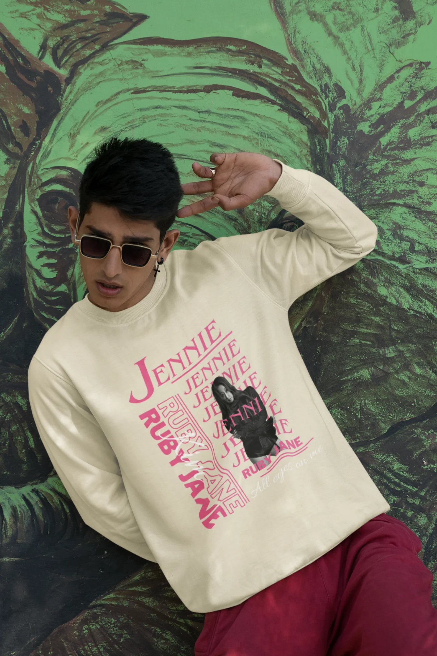 Second front view of male model wearing a cream sweatshirt featuring a stylish design inspired by Blackpink member Jennie. Ideal for fans of Jennie, Blackpink, and K-Pop music enthusiasts interested in idol fashion.