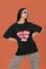 2nd front view of a female model wearing a black oversized t-shirt with the text 