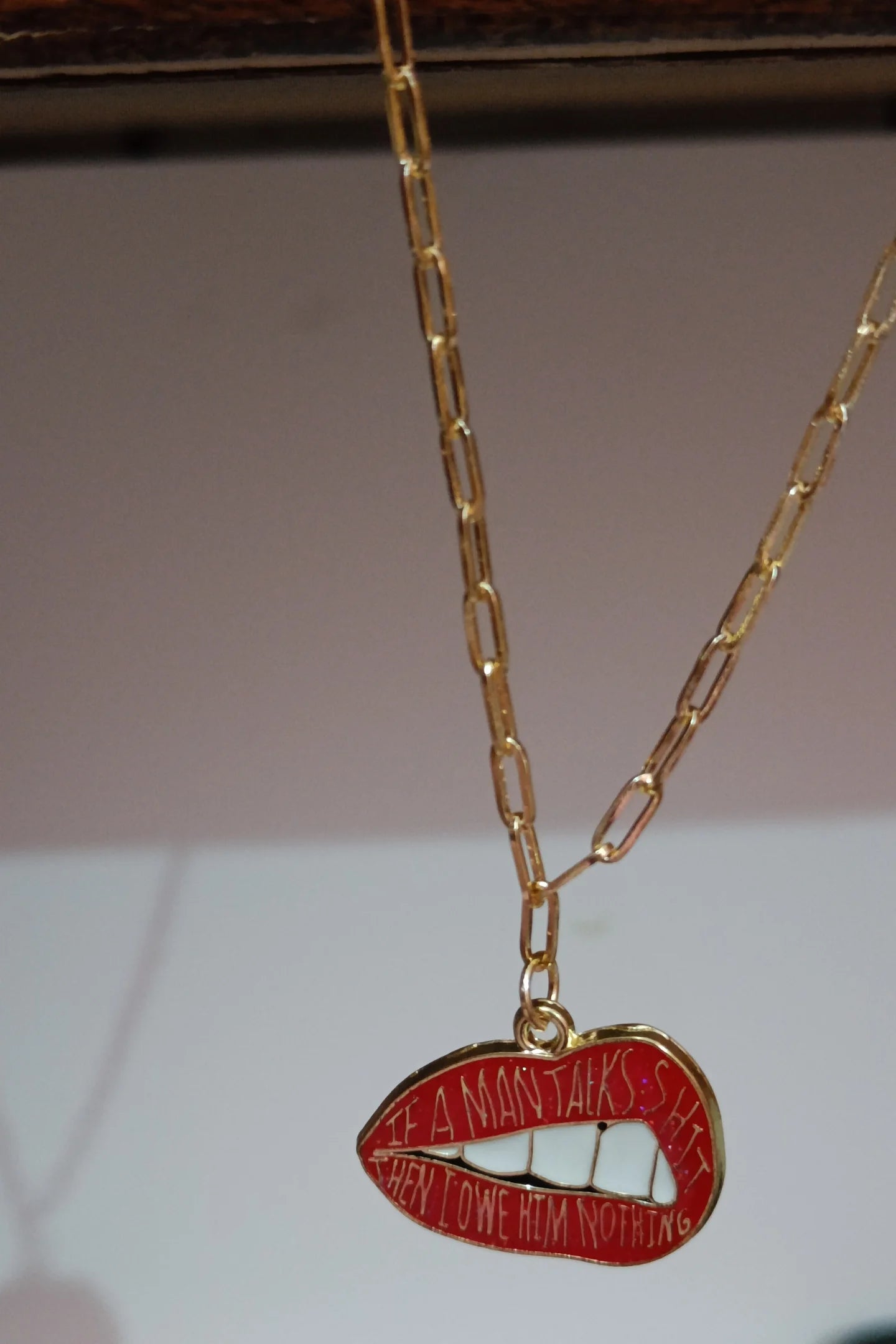 First image of an anti tarnish gold chain necklace featuring the Taylor Swift phrase "You Owe Him Nothing." Perfect for all Swifties.