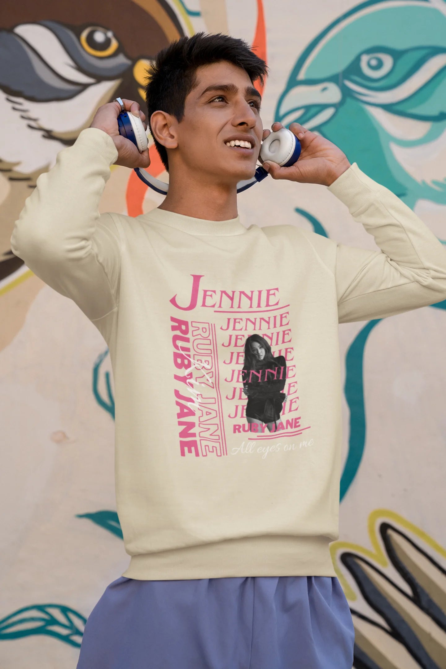 Third front view of male model wearing a cream sweatshirt featuring a stylish design inspired by Blackpink member Jennie. Ideal for fans of Jennie, Blackpink, and K-Pop music enthusiasts interested in idol fashion.