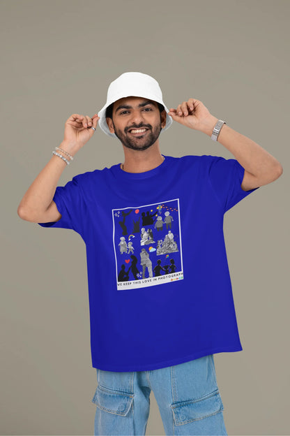 First front view of a male model wearing a royal blue oversized t-shirt featuring a design that represents cherished memories, inspired by Ed Sheeran's "Photograph."