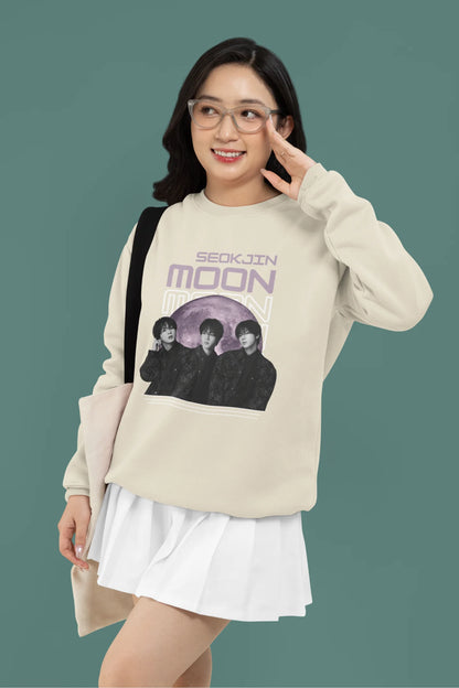 First front view of female model wearing an cream sweatshirt featuring a unique design inspired by BTS member Jin, also known as "Worldwide Handsome." Ideal for fans of BTS and K-Pop music enthusiasts in general. 