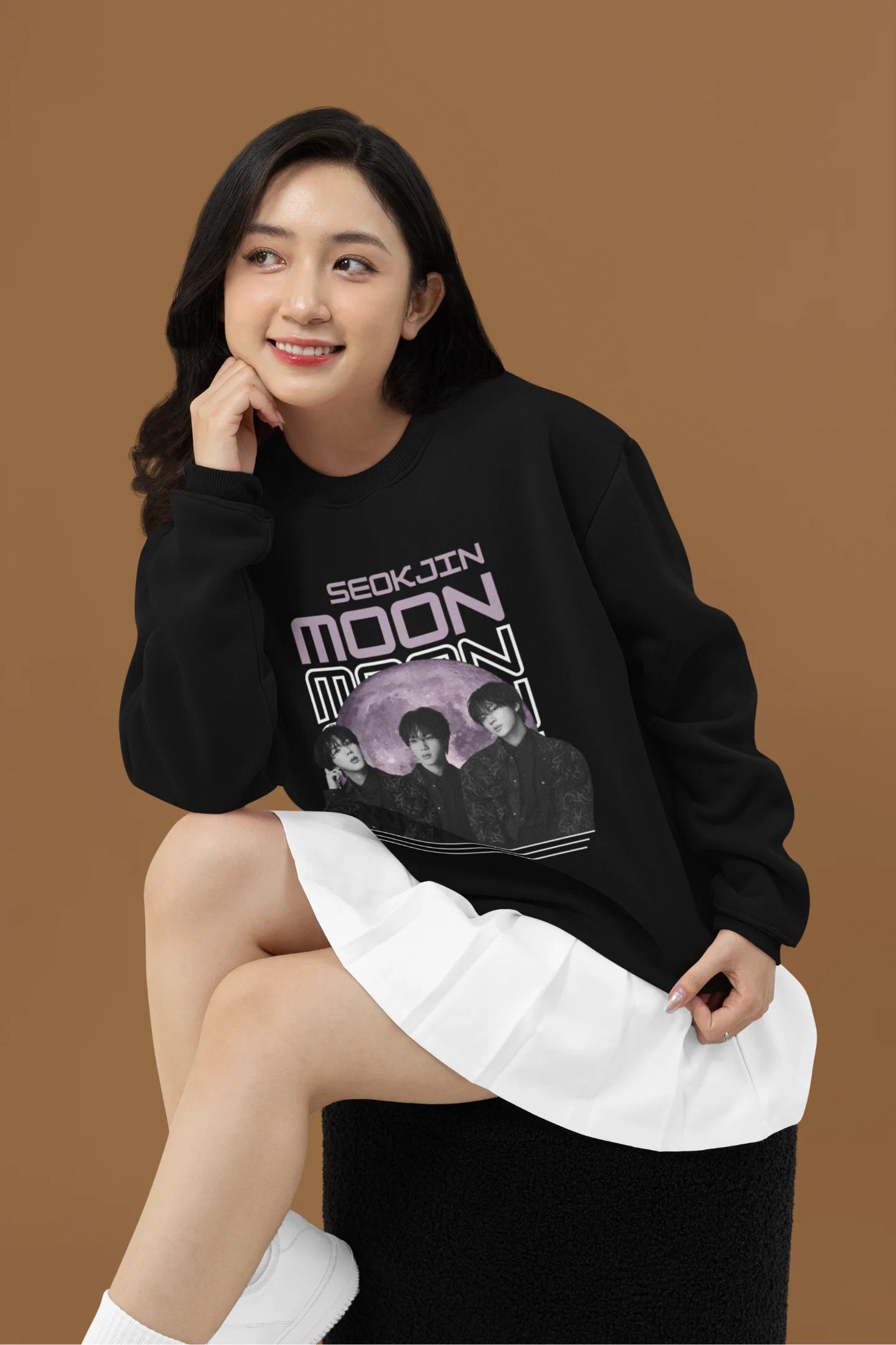 Fourth front view of female model wearing an black sweatshirt featuring a unique design inspired by BTS member Jin, also known as "Worldwide Handsome." Ideal for fans of BTS and K-Pop music enthusiasts in general. 