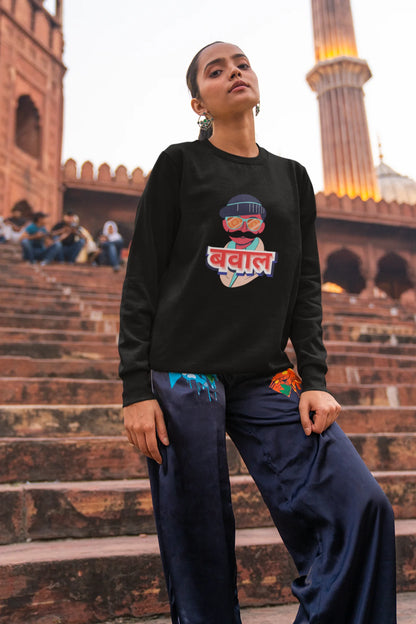 4th front view of a female model wearing a black oversized t-shirt with "Bawaal" in a stylish Hindi.