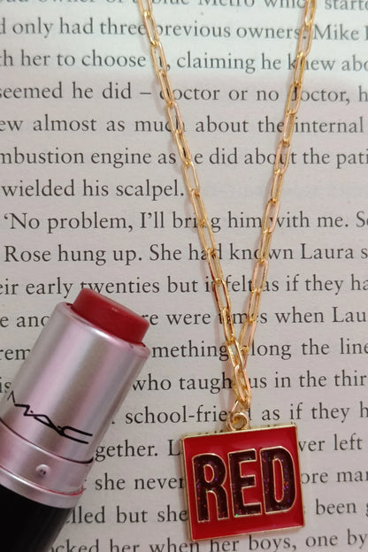 First image of a taylor swift RED era themed anti tarnish gold chain.