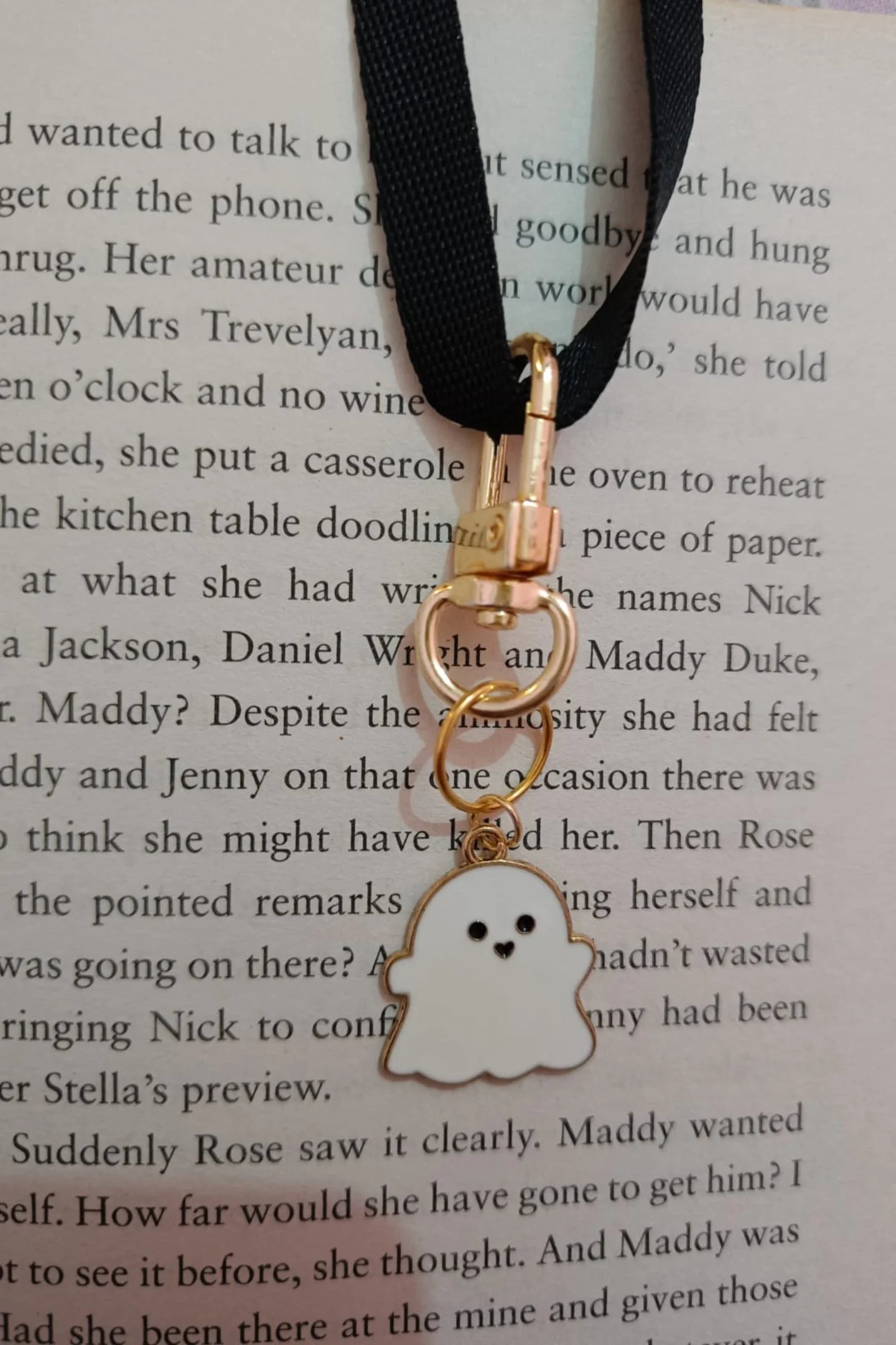 Second view of white colored keychain featuring a cute spooky adorable ghost design.