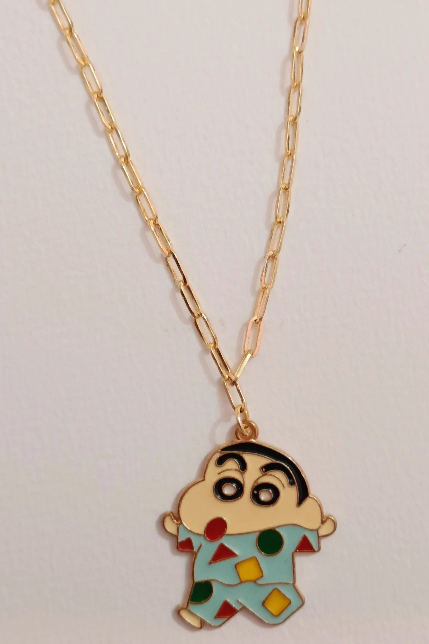 Second view of an anti tarnish gold chain necklace featuring Shinchan, the mischievous boy from the popular anime series.