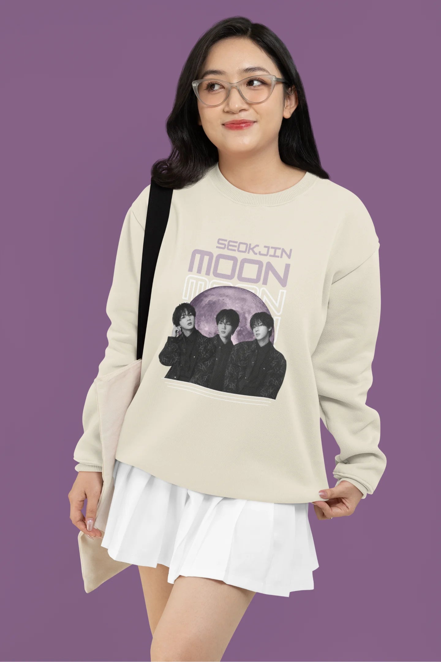 Third front view of female model wearing an cream sweatshirt featuring a unique design inspired by BTS member Jin, also known as "Worldwide Handsome." Ideal for fans of BTS and K-Pop music enthusiasts in general. 