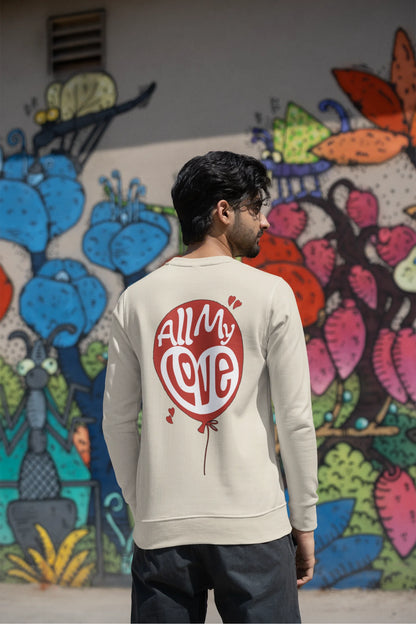 Back view of a male model wearing a cream sweatshirt with a heart design and the text "All My Love".