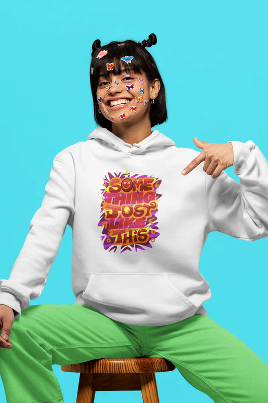 First front view of a female model wearing an off-white hoodie featuring the designs inspired from Coldplay's "Something Just Like This" music video.