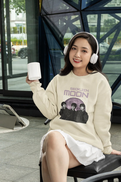 Fourth front view of female model wearing an cream sweatshirt featuring a unique design inspired by BTS member Jin, also known as "Worldwide Handsome." Ideal for fans of BTS and K-Pop music enthusiasts in general. 