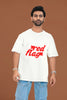 2nd front view of a male model wearing an off-white oversized t-shirt with the text 