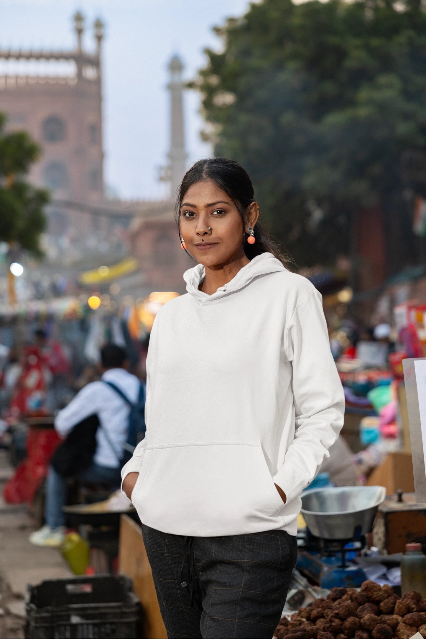 Fifth front view of a female model wearing a white hoodie with a Japanese art style tiger design.