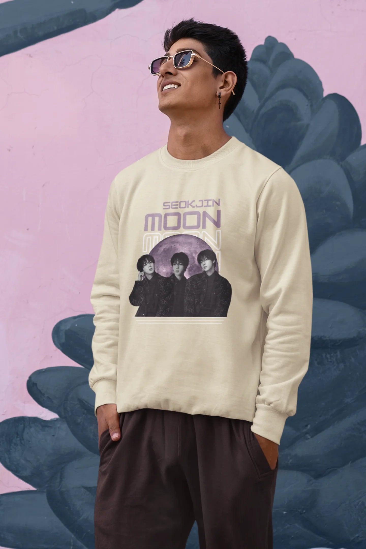 Second front view of male model wearing an cream sweatshirt featuring a unique design inspired by BTS member Jin, also known as "Worldwide Handsome." Ideal for fans of BTS and K-Pop music enthusiasts in general. 