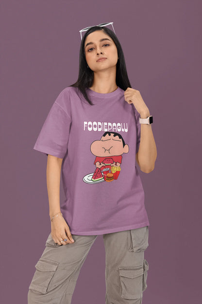 First front of a female view model wearing  a dirty purple oversized t-shirt featuring Shinchan eating a big meal showing his foodie side.