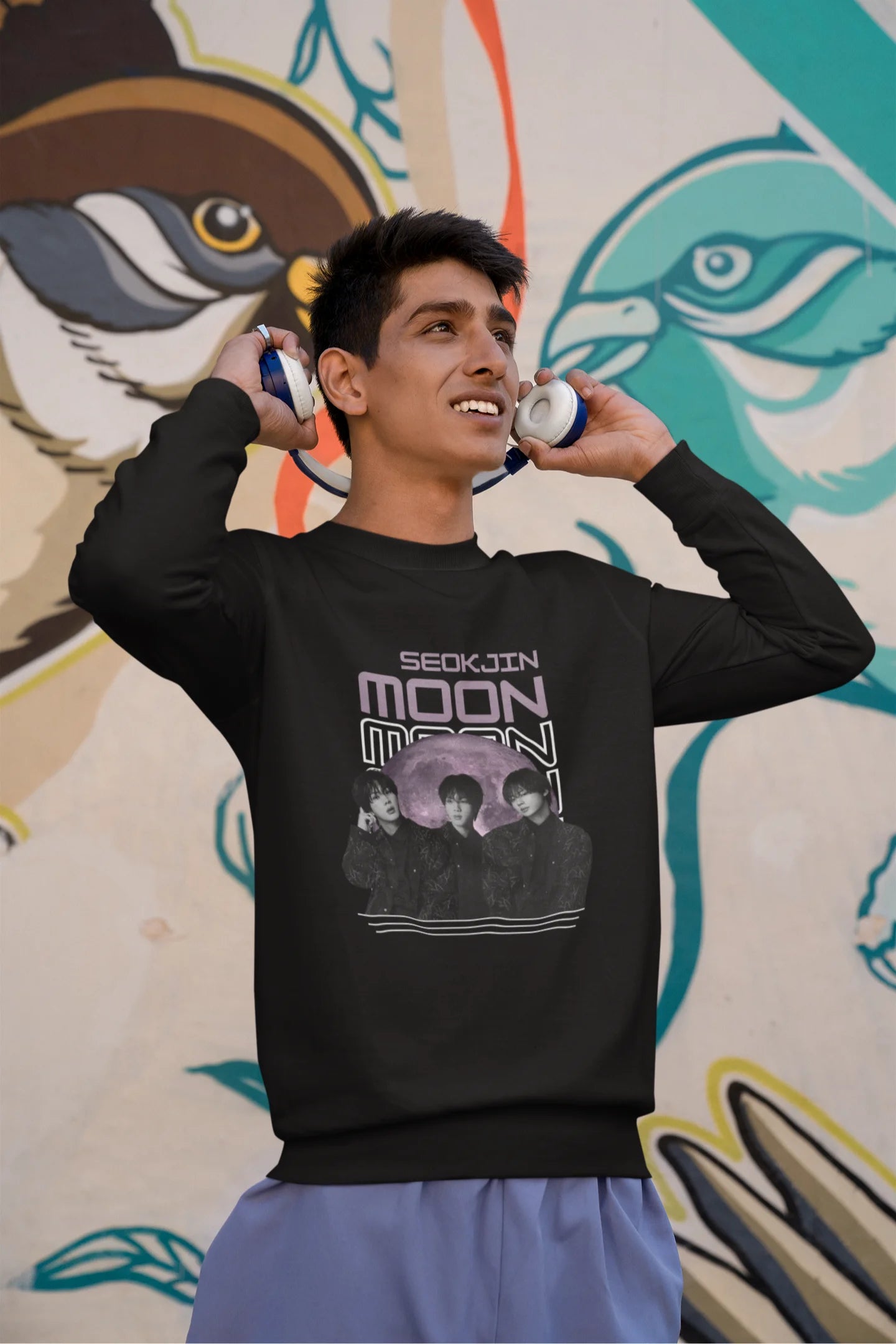 Third front view of male model wearing an black sweatshirt featuring a unique design inspired by BTS member Jin, also known as "Worldwide Handsome." Ideal for fans of BTS and K-Pop music enthusiasts in general. 