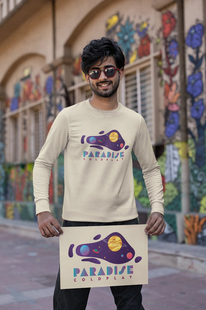 First front view of a male model wearing an cream sweatshirt with the "Paradise" album artwork by Coldplay.