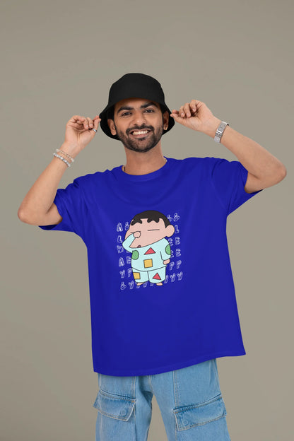 First front view of a male model wearing a royal blue oversized t-shirt featuring  Shinchan looking sleepy.