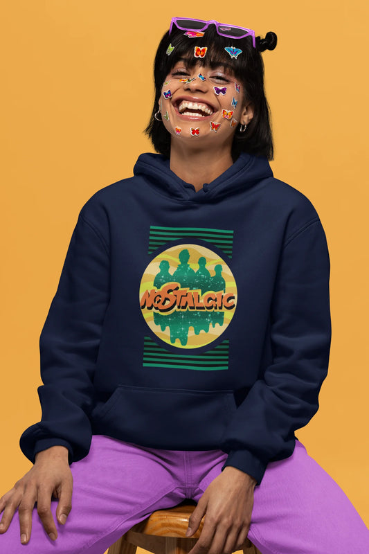 First front view of a female model wearing an navy blue hoodie with a shadow silhouette of the Coldplay band members and the word "Nostalgic" printed on it.