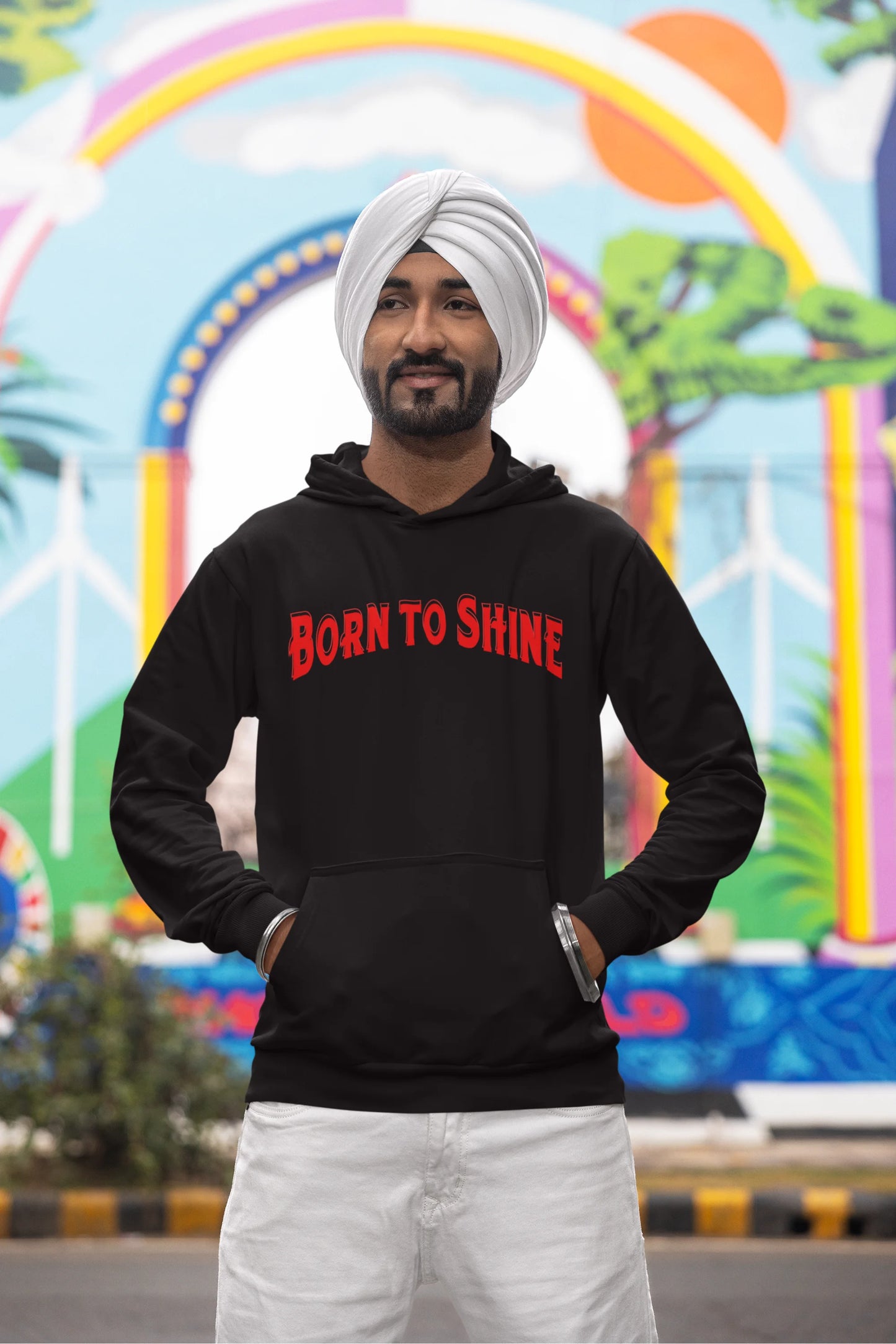 Third front view of a male model wearing a black Diljit Dosanjh hoodie with the text "Born to Shine."