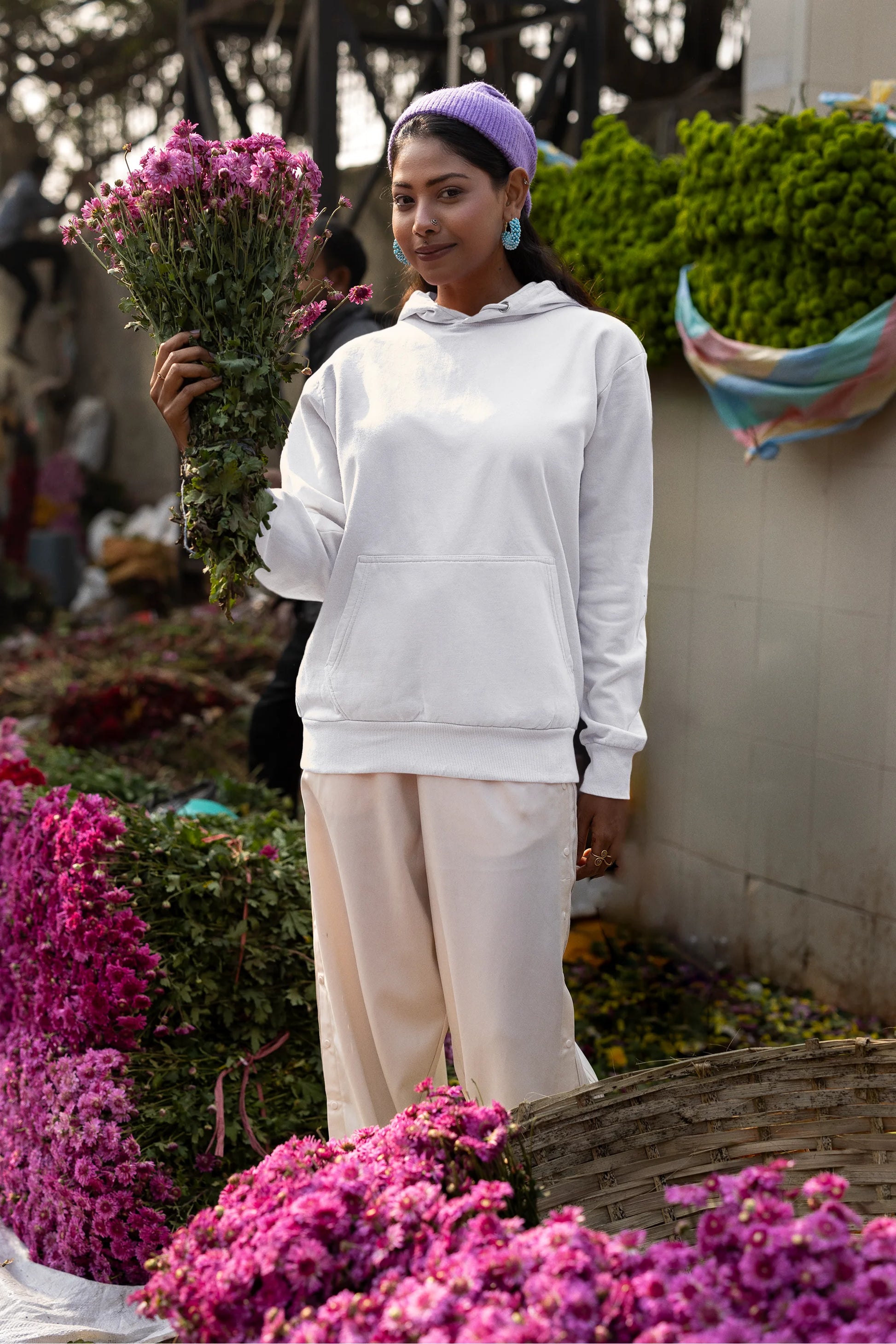 Second front view of a female model wearing a white hoodie with a Japanese art style tiger design.