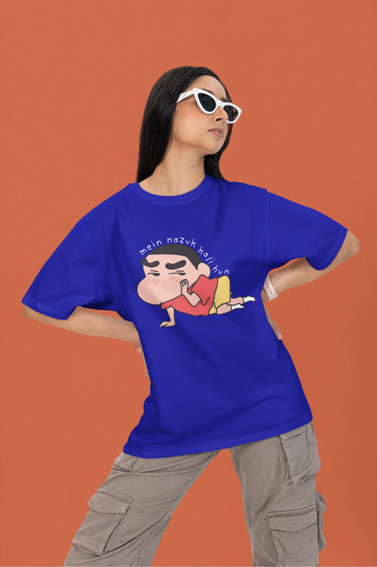First front view of a female model wearing a royal blue oversized t-shirt featuring Shinchan saying "Mein Nazuk Kali Hun."