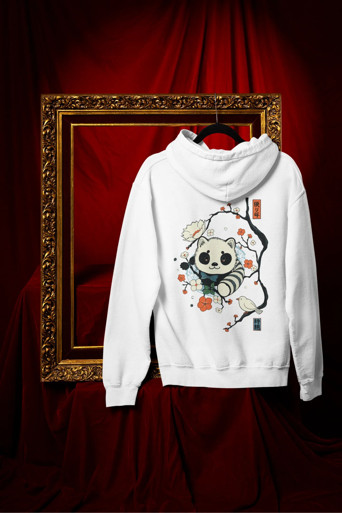 Back view of a white hoodie with a panda fox surrounded by bamboo.