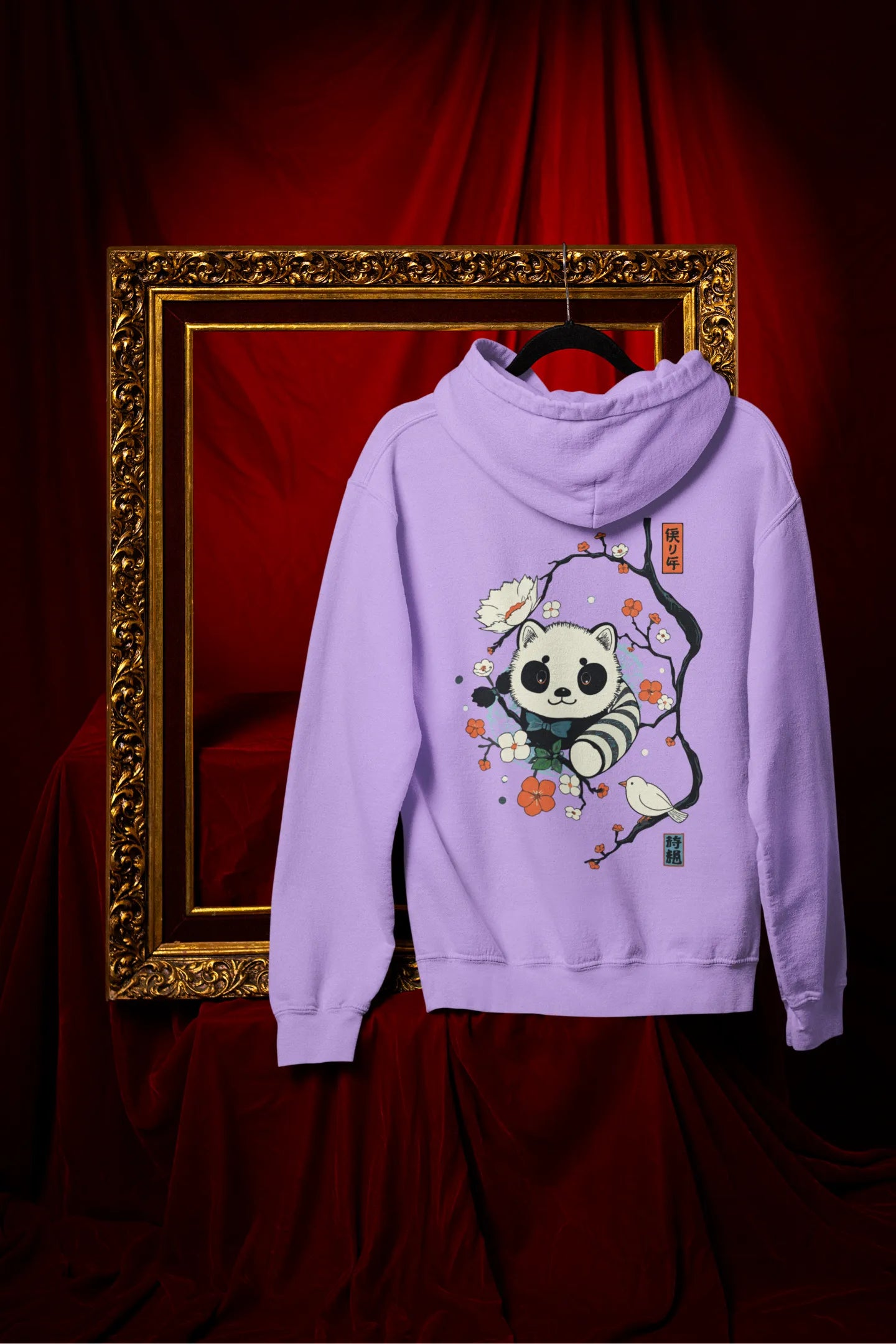 Back view of a lavender hoodie with a panda fox surrounded by bamboo.