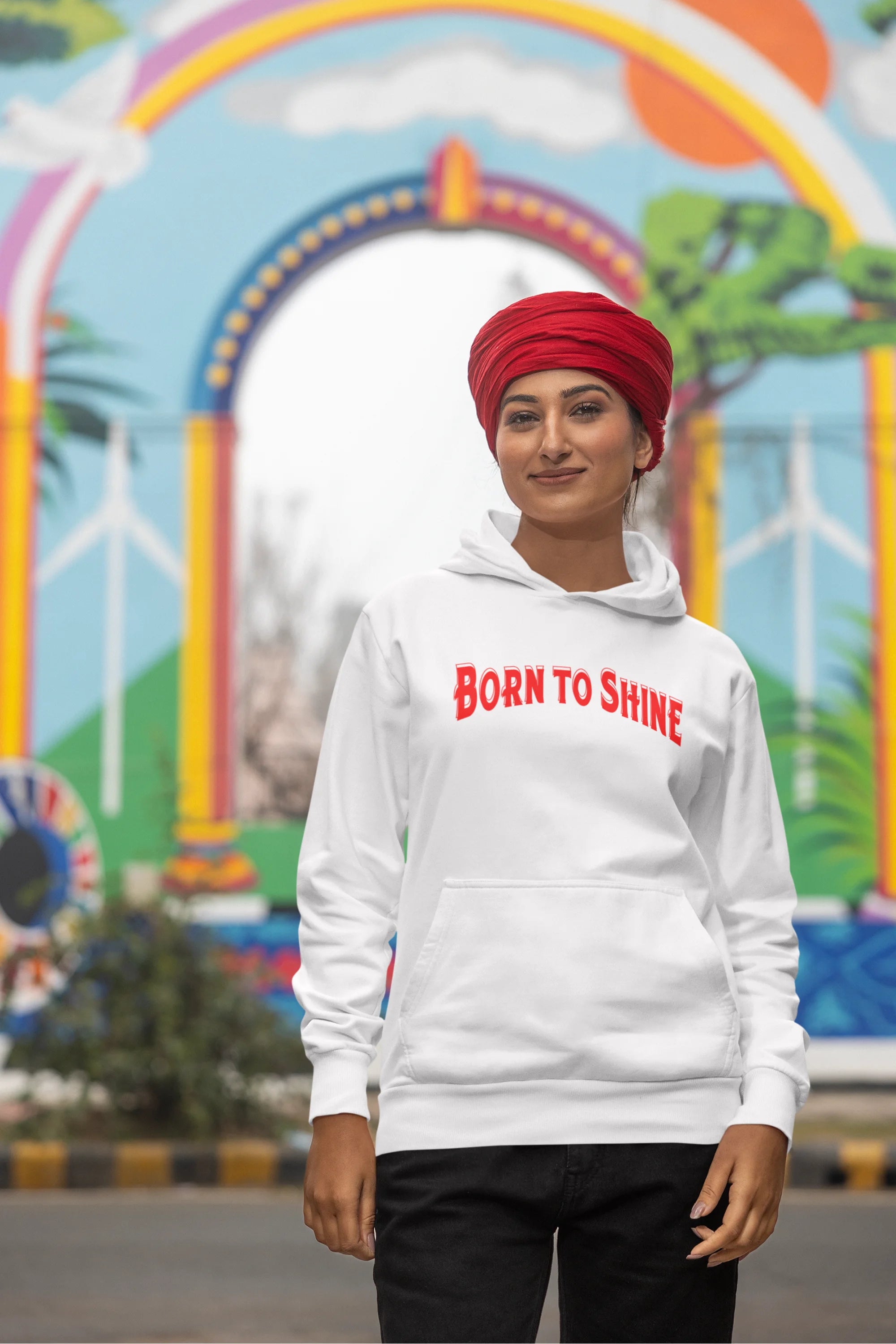 Second image of a female model wearing a off-white Diljit Dosanjh hoodie with the text "Born to Shine."