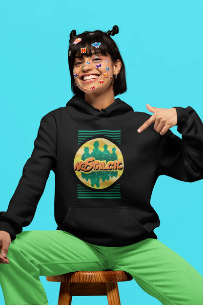 6th front view of a female model wearing an black hoodie with a shadow silhouette of the Coldplay band members and the word "Nostalgic" printed on it.