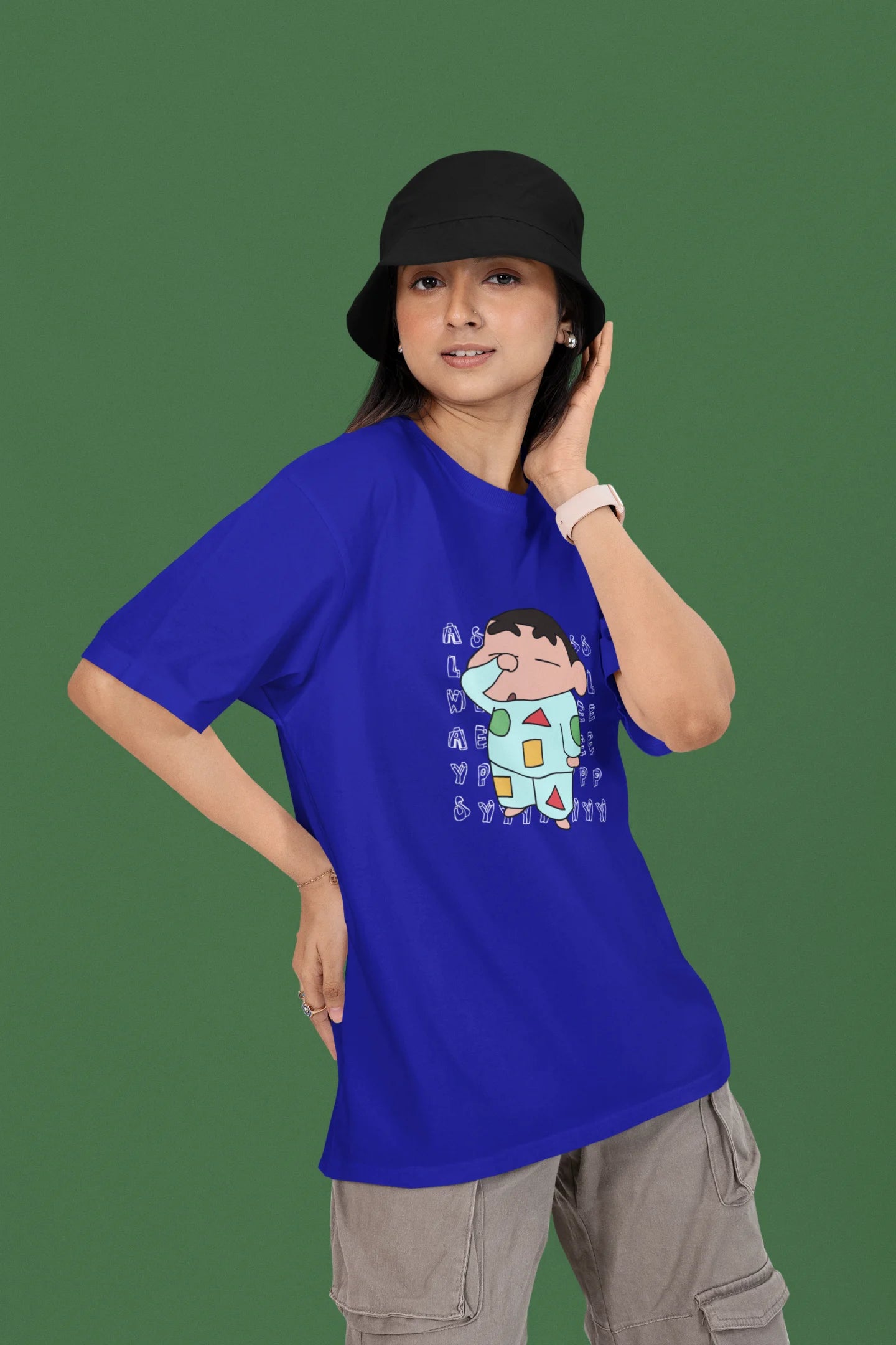 2nd front view of a female model wearing a royal blue oversized t-shirt featuring  Shinchan looking sleepy.