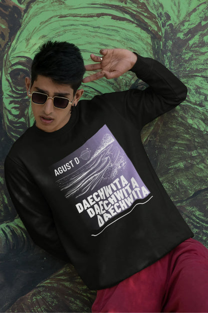 Third front view of a male model wearing a black sweatshirt featuring a bold design inspired by BTS member Suga's alter ego, August D. Ideal for BTS fans (ARMY) and K-Pop enthusiasts who love rap music and artist individuality.