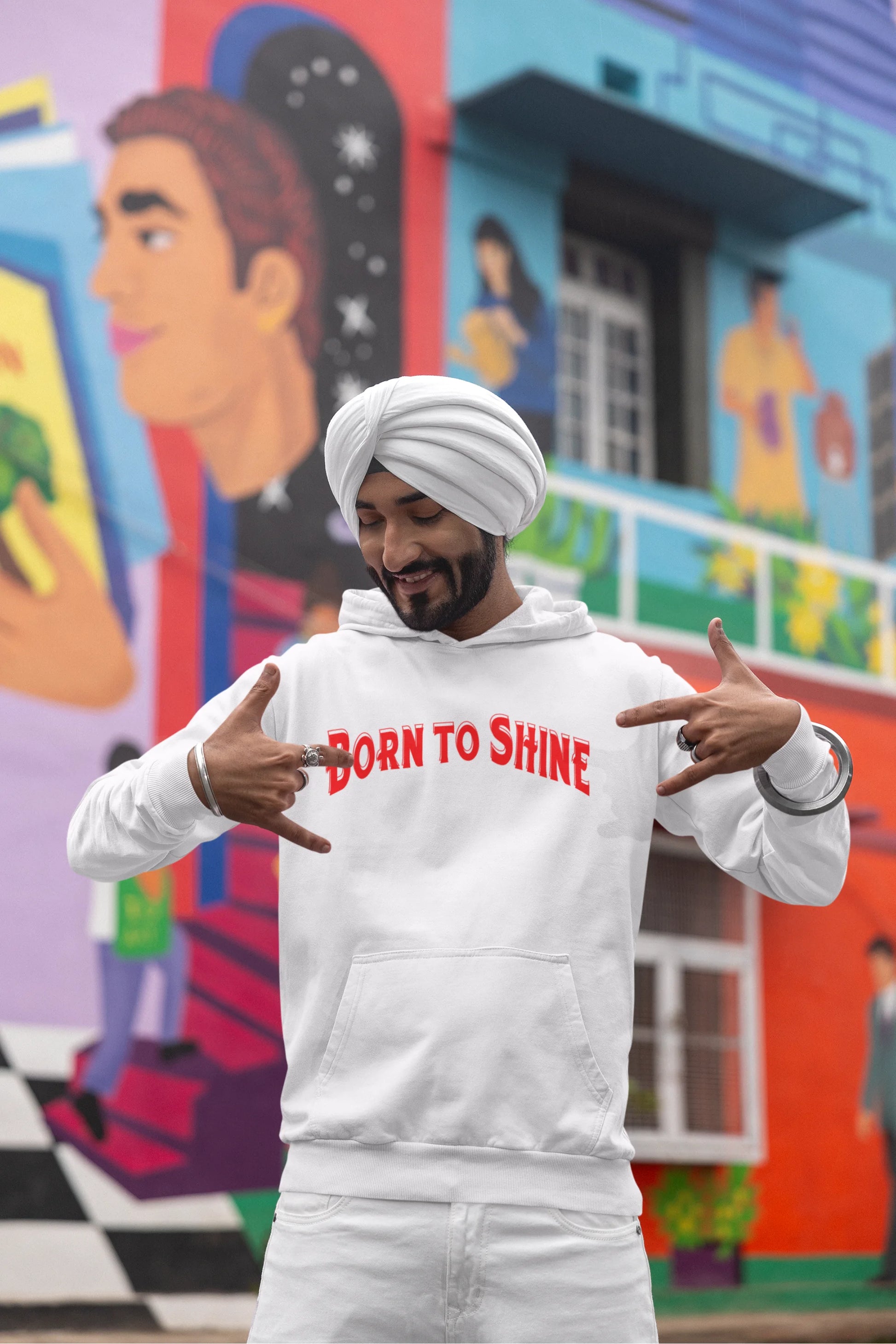 Fourth image of a male model wearing a off-white Diljit Dosanjh hoodie with the text "Born to Shine."