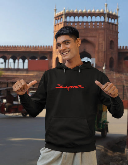 Second front view of a male model wearing a black hoodie featuring a Toyota Supra design, exuding speed and power.