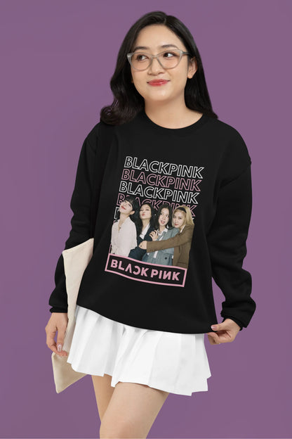 First front view of a female model wearing a black sweatshirt featuring a stylish design inspired by the K-Pop girl group Blackpink. Ideal for Blinks (Blackpink fans) and K-Pop music enthusiasts.