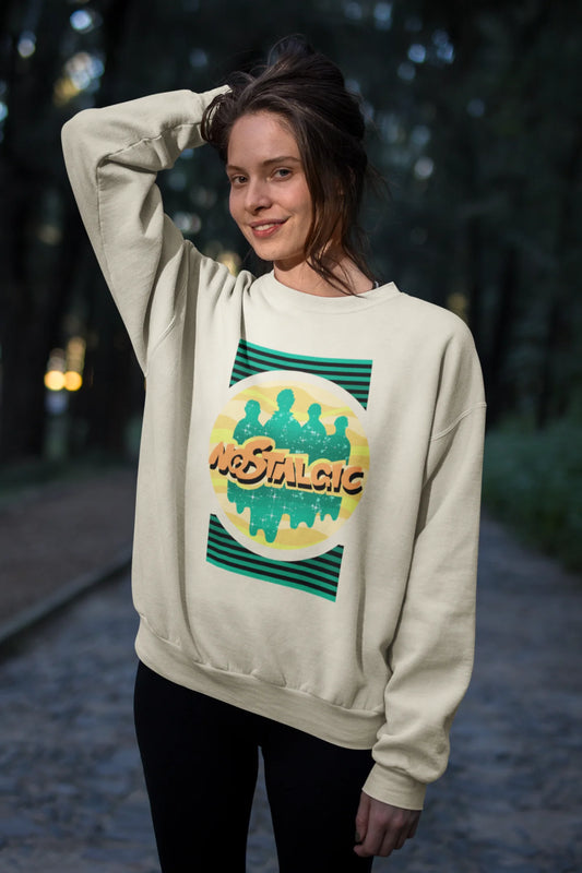 Second view of a female model wearing an oversized cream sweatshirt with a shadow silhouette of the Coldplay band members and the word "Nostalgic" printed on it.