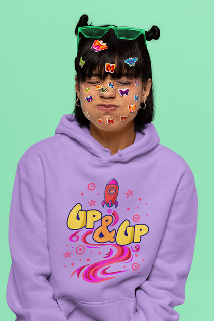 Sixth front view of a female model wearing an lavender hoodie with a rocket ship design and the text "Up & Up".