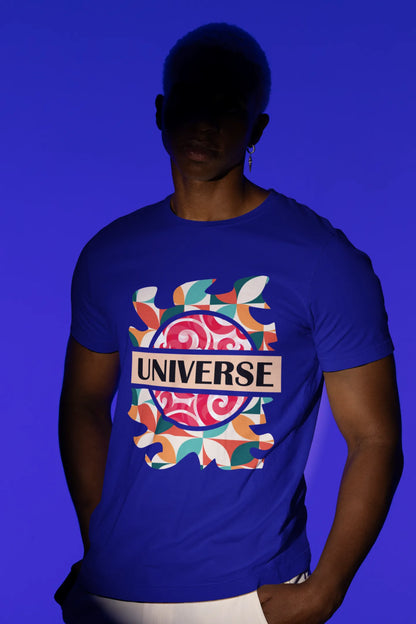 First front view of a male model wearing an royal blue oversized t-shirt with a cosmic Universe design inspired by Coldplay.