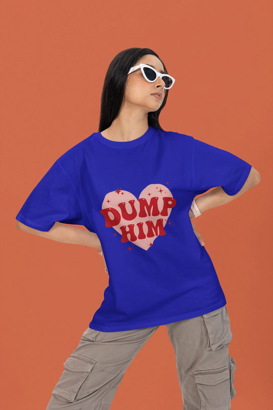 2nd front view of a female model wearing a royal blue oversized t-shirt with the text "Dump Him" printed on it.