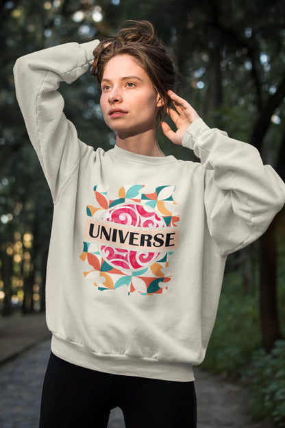 First front view of a female model wearing an cream sweatshirt with a cosmic Universe design inspired by Coldplay.