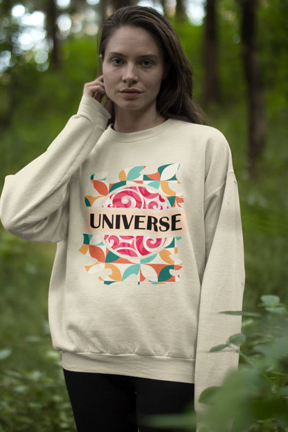 Second front view of a female model wearing an cream sweatshirt with a cosmic Universe design inspired by Coldplay.