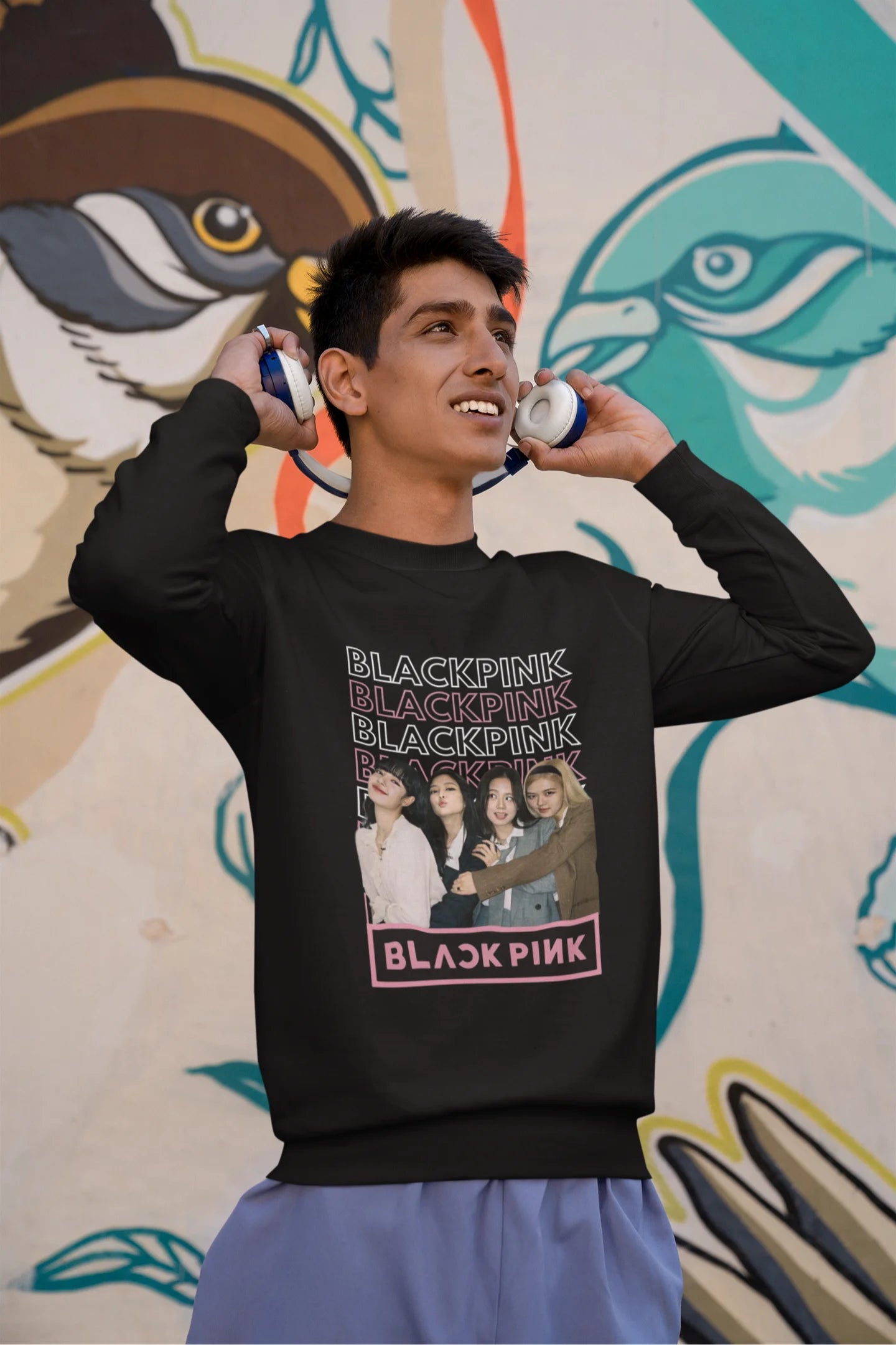 Second front view of a male model wearing a black sweatshirt featuring a stylish design inspired by the K-Pop girl group Blackpink. Ideal for Blinks (Blackpink fans) and K-Pop music enthusiasts.