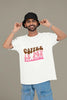 3rd front view of a male model wearing a white oversized t-shirt with the text 