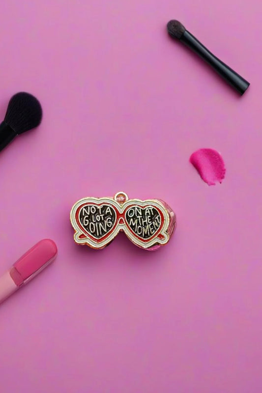 Second view of a charm featuring a design inspired by Taylor Swift's "Evermore" album.