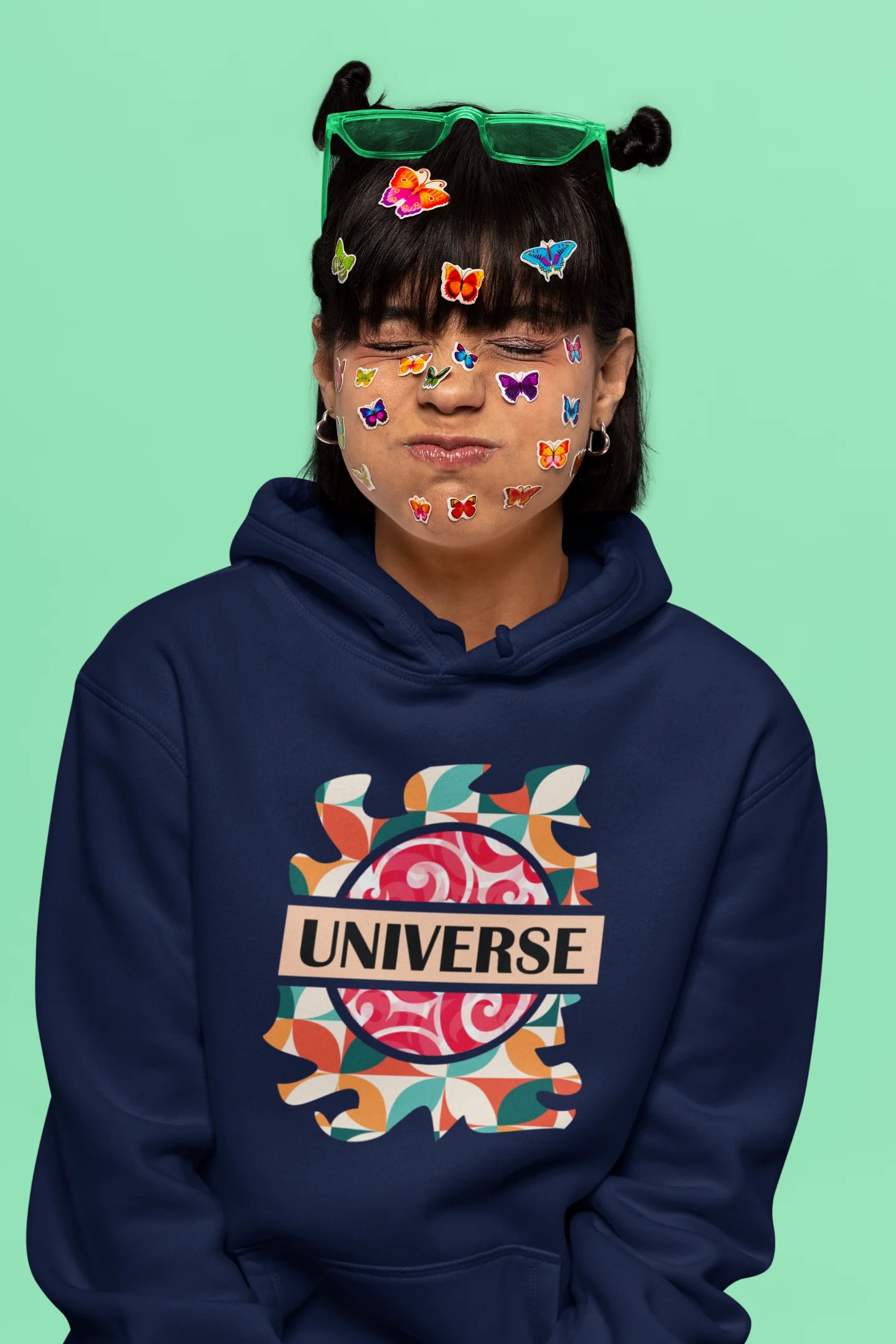 5th front view of a female model wearing an royal blue hoodie with a cosmic Universe design inspired by Coldplay.