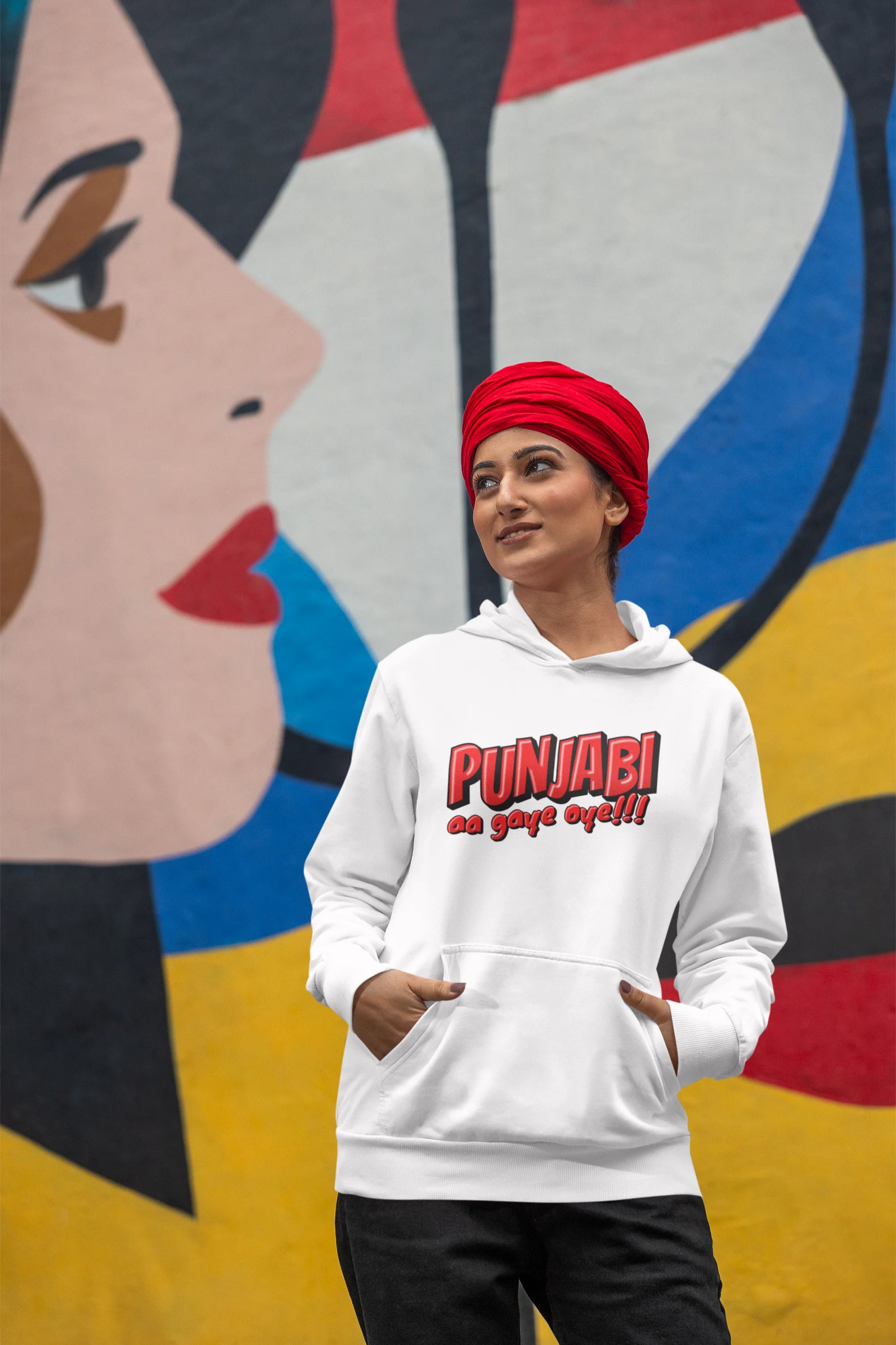 Third front view of a female model wearing an off-white hoodie with the text "Punjabi Aa Gaye".